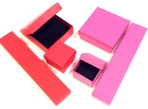 pink and red jewellery boxes for necklace and bracelets, black velvet liner with cut outs 